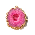 Macro shot of pink agate slice pendant with gold plated edge and natural crystal texture - Rose Red