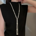 Detail of long irregular pearl necklace with Y-shape tassel and silver diamond-set clasp - Y-Shape Gradient Pearl (36#) / White (6-10mm)