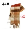Soft rainbow checkered scarf in orange, brown, and cream with long decorative tassels - Brown Red Plaid
