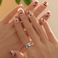 Short Halloween press-on nails featuring cute pumpkin and ghost patterns over nude base - XD-61-16 Halloween Pumpkin Ghost Moon Graffiti