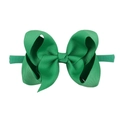 Macro shot of green ribbed fabric bow on soft elastic nylon baby headband detail - Green