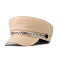 Detail of beige baker boy hat with silver chain decoration and side button accent - Beige