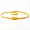 Slim yellow PU leather waist belt for women with a gold metal buckle on white background - Yellow