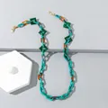 Bunte Acryl-Brillenkette mit geometrischen Gliedern in Blau, Bernstein und Grüntönen - Blaugrün