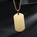 Detailed close-up of a polished gold stainless steel rectangle pendant on a twist chain - Military Tag / Gold