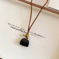 Macro detail of retro mini bag pendant with wood bead on brown velvet necklace cord - Literary Black Bag Pendant Brown Suede Necklace / 41# Necklace-Gold-Black-Black