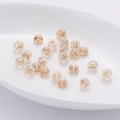 Détail des fermoirs de boucles d'oreilles en silicone plaqué or 18k pour bijoux - Fermoirs en Silicone Plaqué Or KC