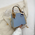 Light blue mini box bag with gold metal trim and decorative printed silk handle - Light Blue