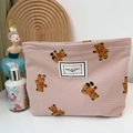 Pink corduroy makeup bag featuring brown bear patterns and a Time to Party label - Pink Bear