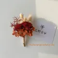 Macro detail of handmade autumn-toned dried flower corsage with rose and rustic jute twine - Forest Flower 7 (Dark Red Rose)