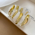 Detailansicht der goldenen Metallglieder und marmorierten weißen Harzglieder des Armbands - Armband-Weiß