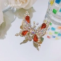 Golden butterfly hair clip with colorful rhinestones and red drop-shaped crystals - Teardrop Crystal Butterfly / Red