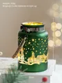 Green Christmas lantern with cutout trees and houses, 12cm high with glowing warm LED light - Short Handle Style / Green