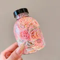 Jar of 1000 small thickened cream colored elastic hair bands with 0.1cm width - Small Thickened Creamy Color 1000 Pcs (Jar)