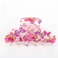 Detail of pink transparent acrylic hair claw clip with colorful butterfly patterns - Butterfly Hair Claw - 9cm