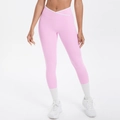 Detail der High-Waist Yoga-Leggings mit weißem Kreuz-V-Ausschnitt am Taillenbund - S / Kirschblütenrosa
