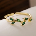 Gold plated leaf ring featuring emerald green marquise zircons with open adjustable design - Emerald Green Zirconia Fine Leaf Style (13581)