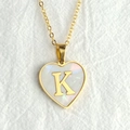 Golden heart necklace with shell inlay and gold letter K pendant on a fine chain - Letter K / Gold