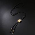 Vintage bronze bolo tie with cross pendant and black braided cord for western cowboy style - Antique Bronze Cross Necklace