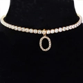 Sparkling gold choker necklace with crystal zircon letter O pendant on neck display - Letter O [Gold]