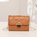 Quilted caramel leather crossbody handbag with V-stitch pattern and gold chain strap - Brown