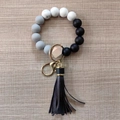 Silicone bead keychain bracelet in black, grey, and white with a black tassel - Black White Grey
