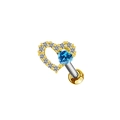Macro detail of golden heart piercing stud with blue gemstone and white zirconia - Blue Heart Style (#3)
