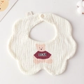 White cotton gauze baby bib with petal edge and cute brown bear print in flat lay view - Gauze Flower Scarf - Barbie Bear