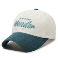 Cream and teal corduroy baseball cap with 'Wonder' embroidery in a side-angle view - Adjustable / Sky Blue
