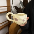 Handcrafted cream ceramic coffee mug with hand-painted purple flowers and irregular shape - Purple Large Tulip Single Mug / Single Cup