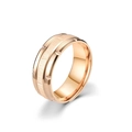 Detail of rose gold titanium ring featuring brushed texture and geometric facets - US 6 / Rose Gold