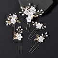 Detail von 5-teiligem Braut-Haarnadel-Set mit Goldblättern und weißen mattierten Blüten - Stil 1 Gold