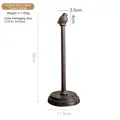 Vertical cast iron bird paper towel holder in rustic bronze finish for kitchen decor - Tailless Bird Holder