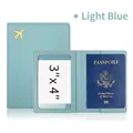 Light blue faux leather passport holder with gold airplane icon and clear ID slot - Light Blue