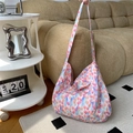Large canvas tote bag featuring vibrant tulip floral print and wide shoulder strap - Cotton Tulip