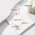 Gouden roestvrijstalen hartarmband met heldere pavé zirkonia op witte textuur - BR-110 Gouden Wit Hart Armband