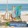 Blue double-sided beach towel with pink flamingos and summer patterns on a beach chair - B90-Flamingo Summer Holiday