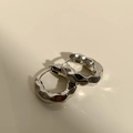 Macro detail of silver irregular wavy hoop earrings with high-polish metallic finish - Silver Ear Buckle (22#)