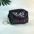 Macro detail of black leopard print coin purse with silver keychain ring and laser finish - Black