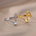 Minimalistische wellenförmige Edelstahlringe mit 18k Gold- und Silberoberflächen - Minimalistische Welle / Gold