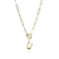 Detail of a gold-plated necklace featuring a letter U pendant and a paperclip chain - Letter U