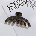Pince à cheveux en forme d'octopus avec strass foncés et finition métal gris - Style Poulpe en Strass