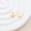 Detailed view of a gold-plated letter J pendant featuring sparkling cubic zirconia stones - Letter J