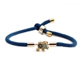 Adjustable blue braided rope bracelet featuring a gold-plated pavé crystal elephant charm - Blue Elephant