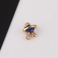 Macro shot of gold-plated planet charm with blue zircon and white crystal detail - 7# Dark Blue
