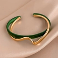 Elegant gold and green enamel wave bangle on luxury champagne silk background - Dark Green (Gold Edge)