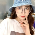 Fashionable oversized transparent grey polarized sunglasses worn by a model in casual setting - Smoke Gray