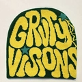 Detailed knit texture of dark green beanie with yellow letters and blue stars - Dark Green with Yellow Letters