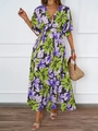 Detailed view of the deep V-neckline on a purple floral maxi dress with short sleeves - 2XL / Blue