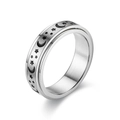Detail of spinning stainless steel ring with engraved black moon and star patterns - 6mm - Rotating Star And Moon / Size 5